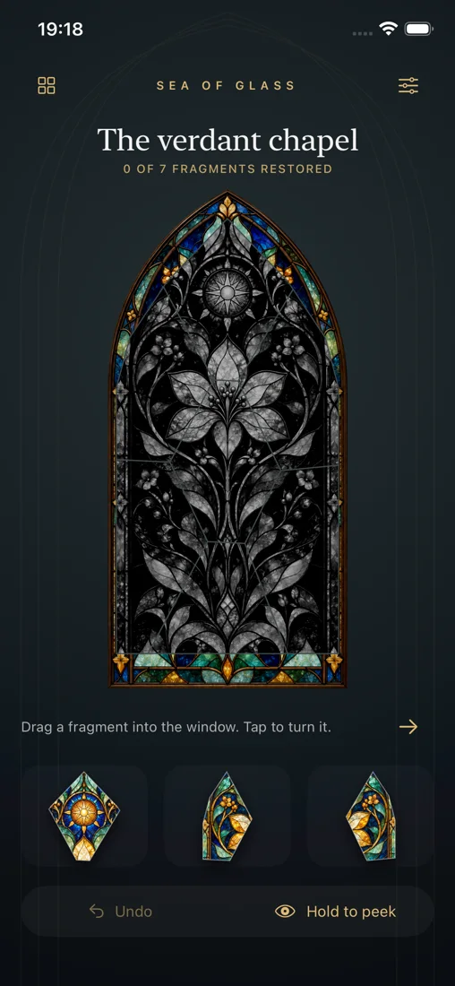 Sea of Glass gameplay: a stained-glass window with loose fragments ready to place